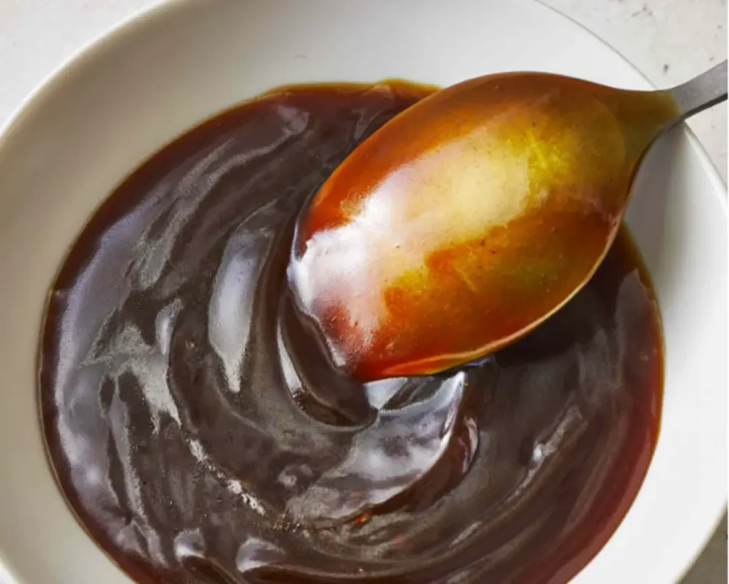 Bowl of homemade teriyaki sauce, showing the fresh ingredients.